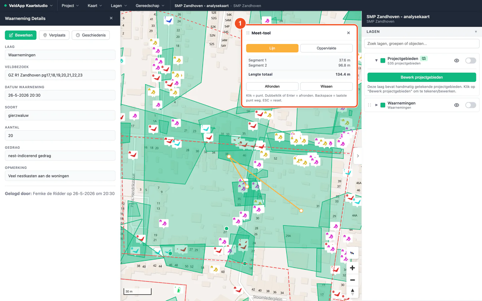 Het paneel Meet-tool met de keuze Lijn of Oppervlakte, een getekende meetlijn op de kaart, de segmenten en de totale lengte